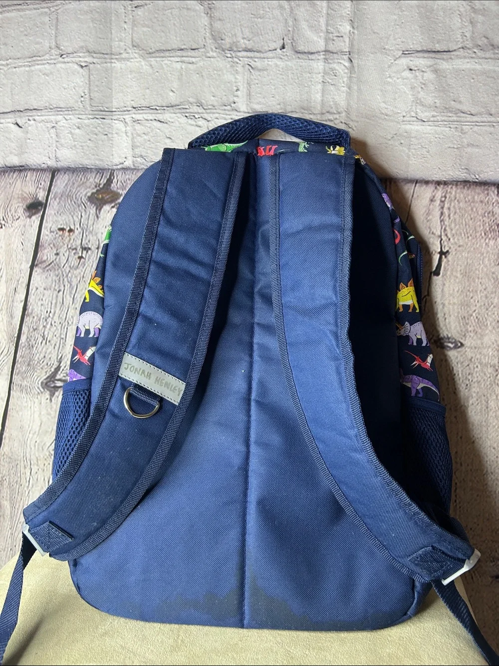 Tommy Bahama Kids Navy Backpack with Colorful Dinosaur Print